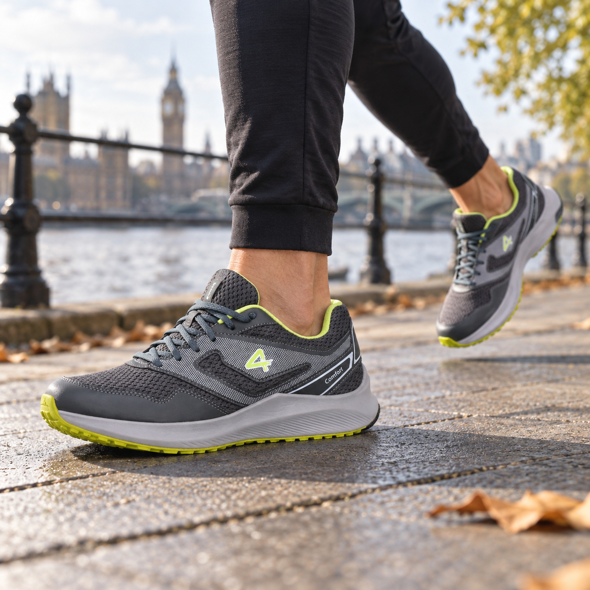 Grey and lime SEGA Comfort R7 trainers worn on a riverside run