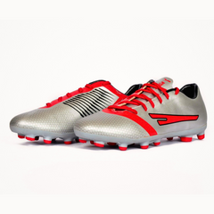 A pair of SEGA PRIME Men's Football Boots with an EVA upper in gray with red and black accents, and a rubber outer sole with moulded studs.